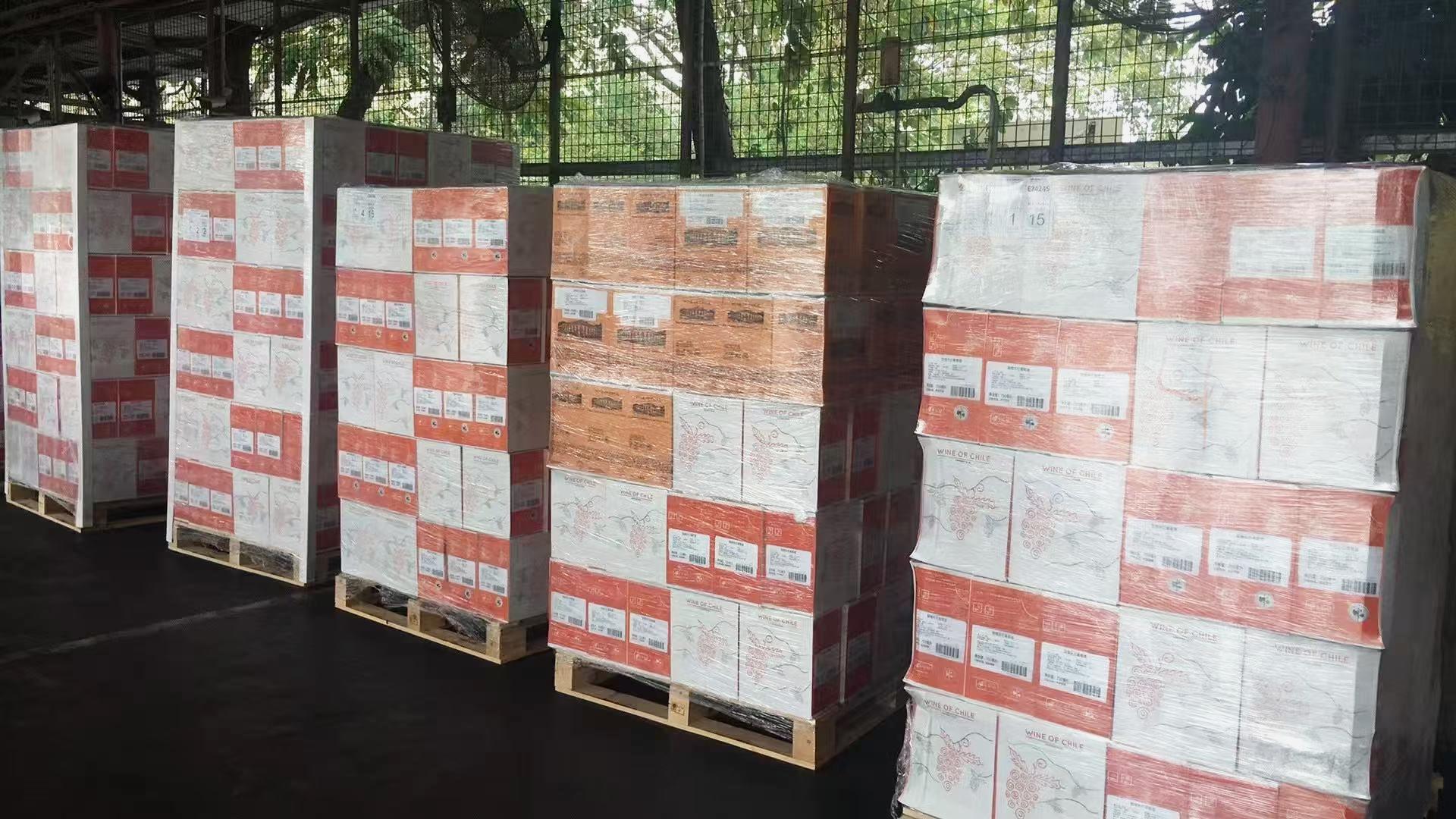 Display of premium rice products with exquisite packaging against a backdrop of rice harvest scenes in golden fields under natural lighting